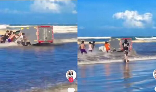 Mobil box berenang di laut bikin pengunjung panik