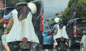 Kasihan, pakaian wanita ini penuh dengan lumpur